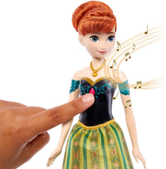 Mattel Disney Die Eiskönigin Singende Anna-Puppe - 30-sekündiger Song-Ausschnitt, klassisches Schlossoutfit, abnehmbarer weicher Rock, kämmbare Haare, für Kinder ab 3 Jahren, Deutsche Version, HMG41