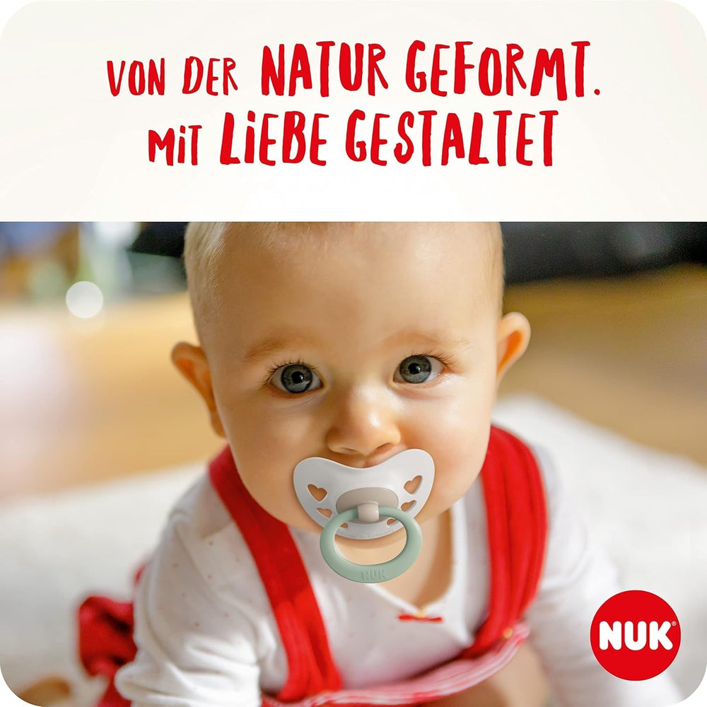 Suzete NUK Signature pentru bebeluși | 0-6 luni | Calmează 95% dintre bebeluși | Suzete din silicon în formă de inimă, fără BPA | Cu husă | Inimioare roz | Pachet de 2