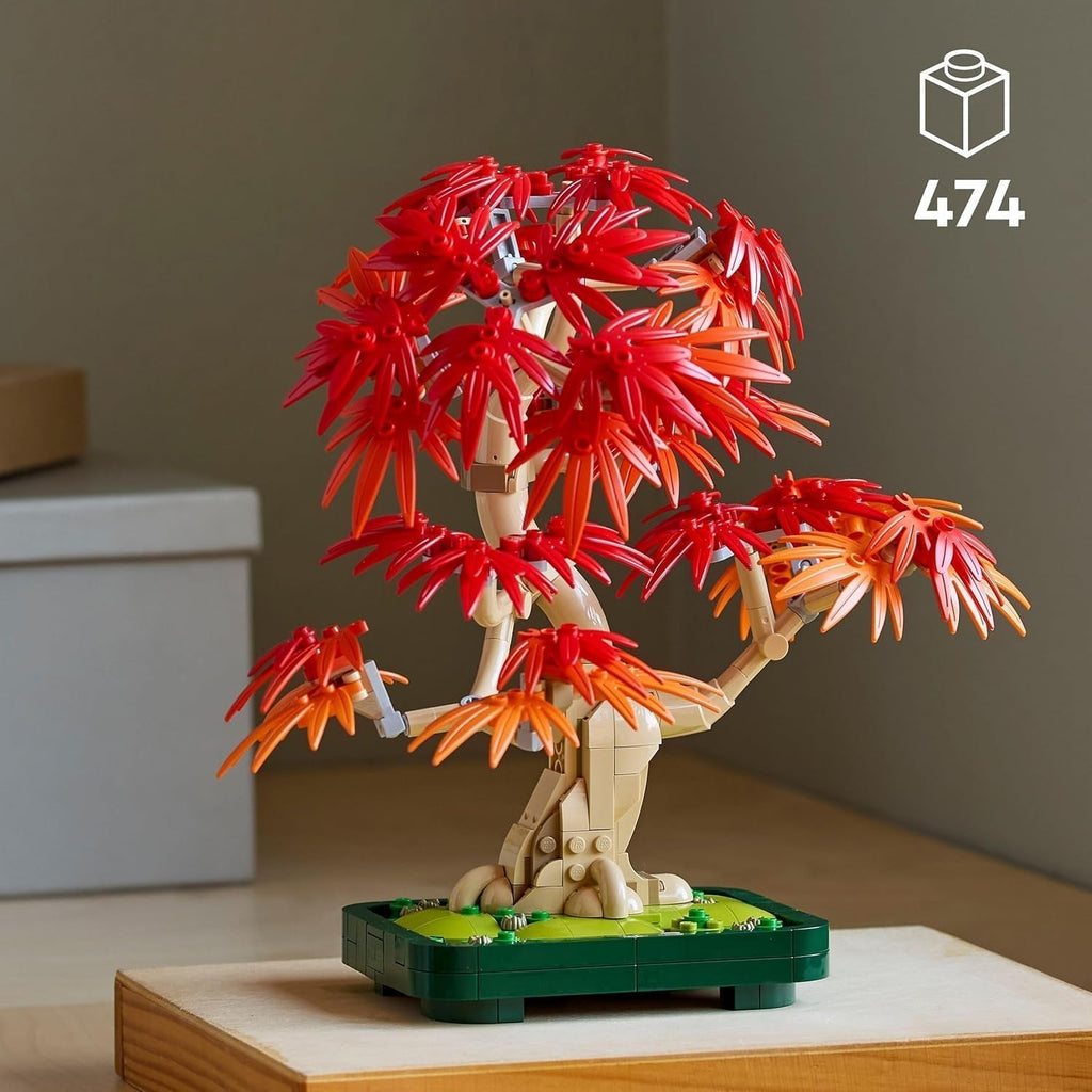 LEGO Botanicals Arțar roșu japonez - Arbore Bonsai - Kit plantă artificială cu frunze roșii și portocalii, plus bol - Decor pentru casă - Idee cadou pentru adulți - 10348 Seturi de constructie Besuche den LEGO-Store
