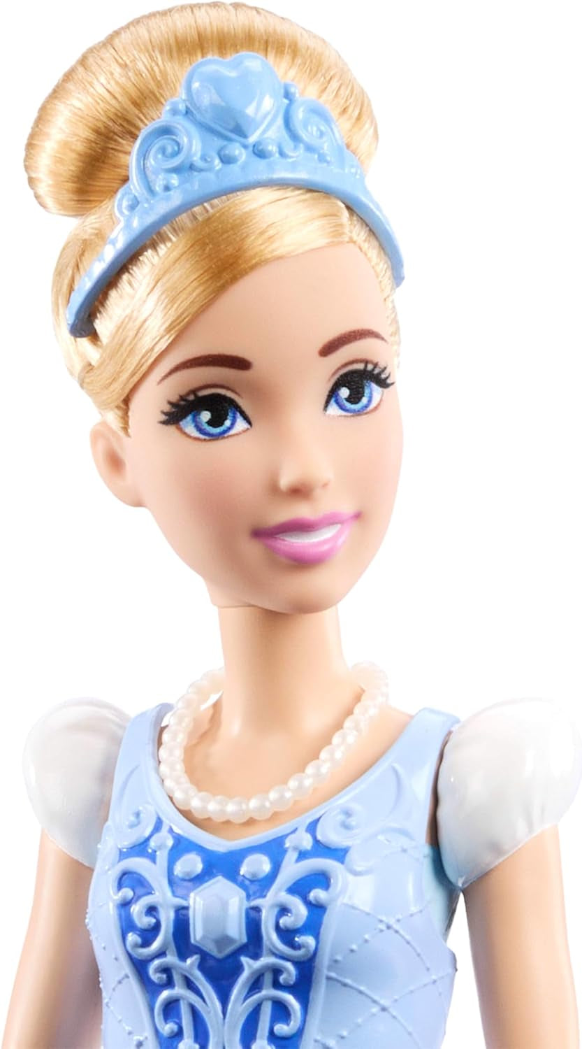 Mattel Disney-Princess-Spielzeuge, Cinderella-Modepuppe mit 2 Looks, 9 Accessoires, 2 Oberteile zum Anklipsen und 2 Röcke. 2-in-1-Geschichten inspiriert vom Disney-Film, JCR95