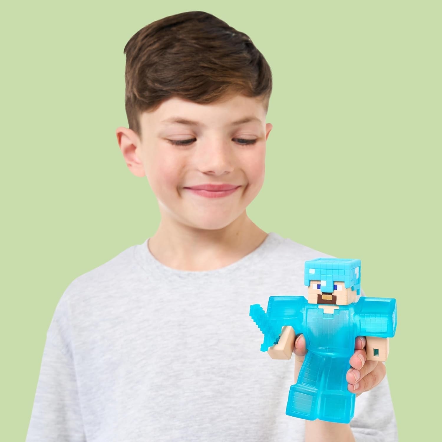 Heroes of Goo Jit Zu – Erweiterbare Minecraft-Figur – Steve mit Diamantrüstung und Schwert, super dehnbarer Goo-Füller mit verstecktem Diamantelement im Inneren, erweiterbar auf Actionfiguren in dreifacher Größe, Naty Shop