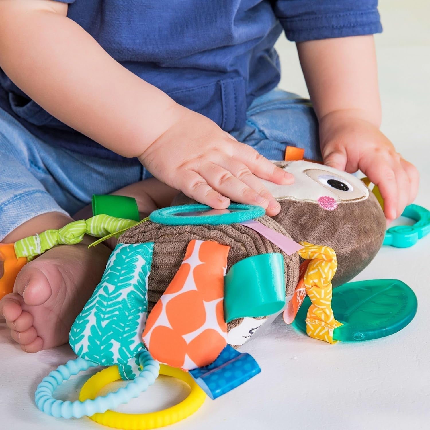 Bright Starts, jucărie pentru cărucior, leneș - cu zornăitor, oglindă și bucle taggie Jucarii Bebe Naty Shop