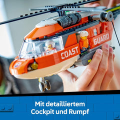 LEGO City Hubschrauber der Küstenwache - Spielzeug Einsatzfahrzeug - Modellbau mit Schiebetüren, Winde, 4 Minifiguren und Hai Figur - Geburtstagsgeschenk für Jungen ab 7 Jahren - 60503