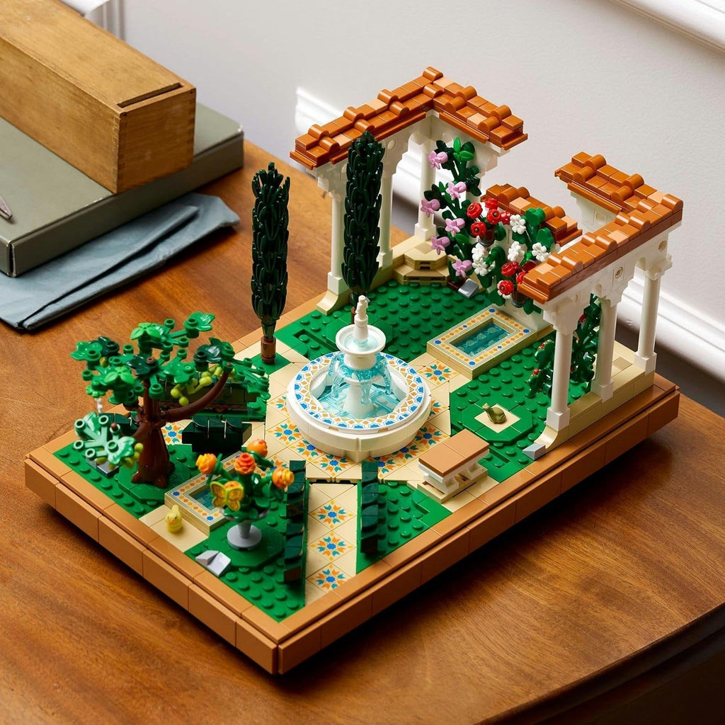 LEGO Icons Fountain Garden - Set de construcție în miniatură pentru adulți cu frunze, chiparoși, copaci, liane, flori - Idee creativă de cadou pentru ziua de naștere, cadou de casă pentru femei, bărbați - 10359 Seturi de constructie Besuche den LEGO-Store