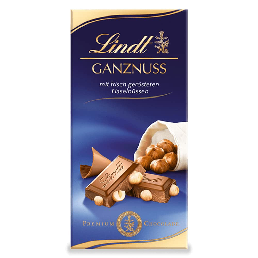 Ciocolata Lindt cu lapte integral fara zahar adaugat și fără gluten, 100 grame Bomboane de Ciocolata Naty Shop 100 grame Ciocolata cu alune de padure intregi